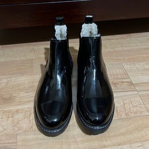Anne Klein black rain boots with faux fur lining.